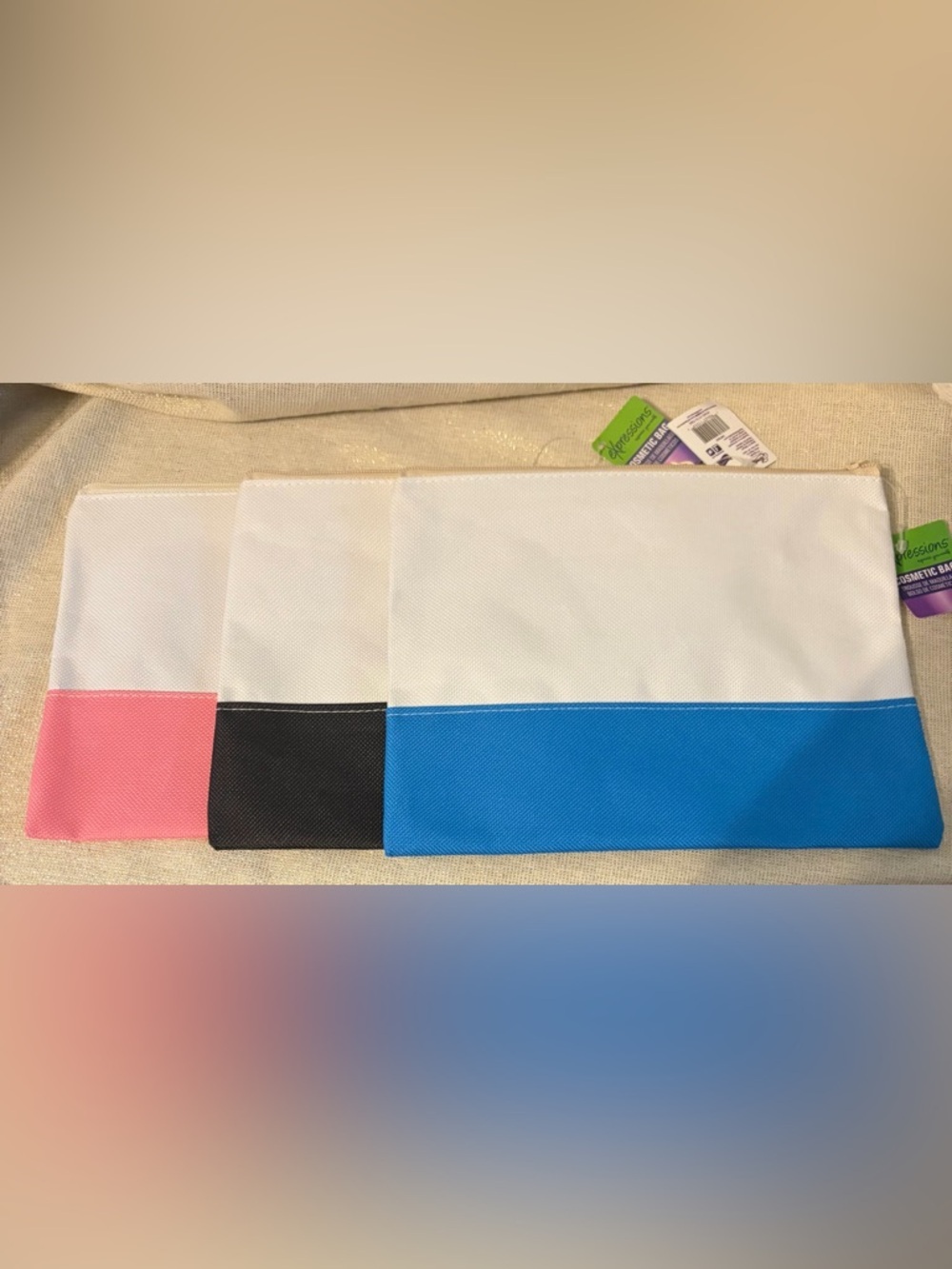 Set of 3 Two-Tone Cosmetic Pouches in White with Pink, Black, and Blue